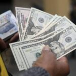Dólar baja de $1,400 y sigue tendencia regional